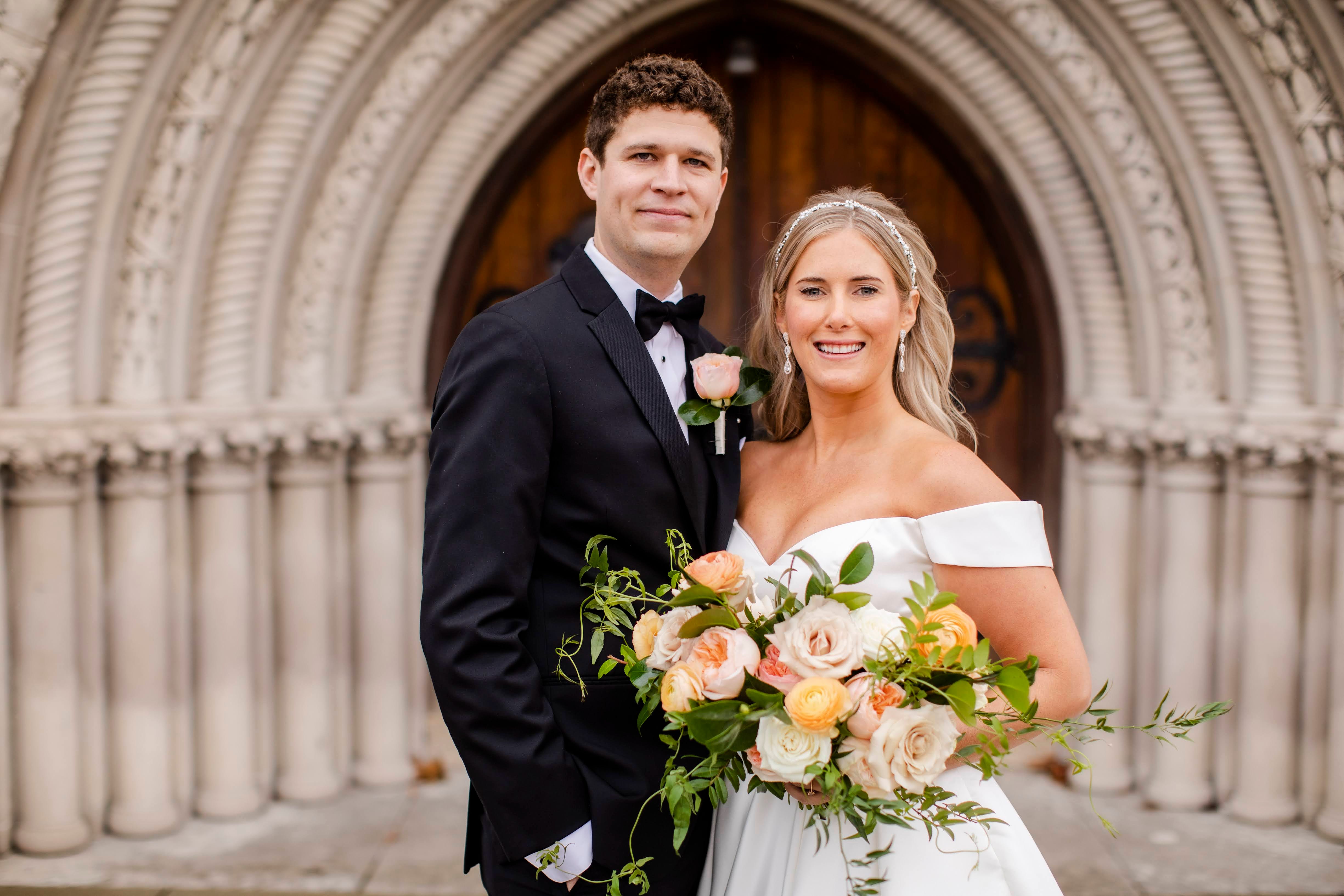 Jennifer and Matthew Stell stand in front of the Bluestone in Columbus, where both ceremony and reception were held.